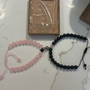 Pink & Black couples bracelets with magnetic link. Comes with box & love note